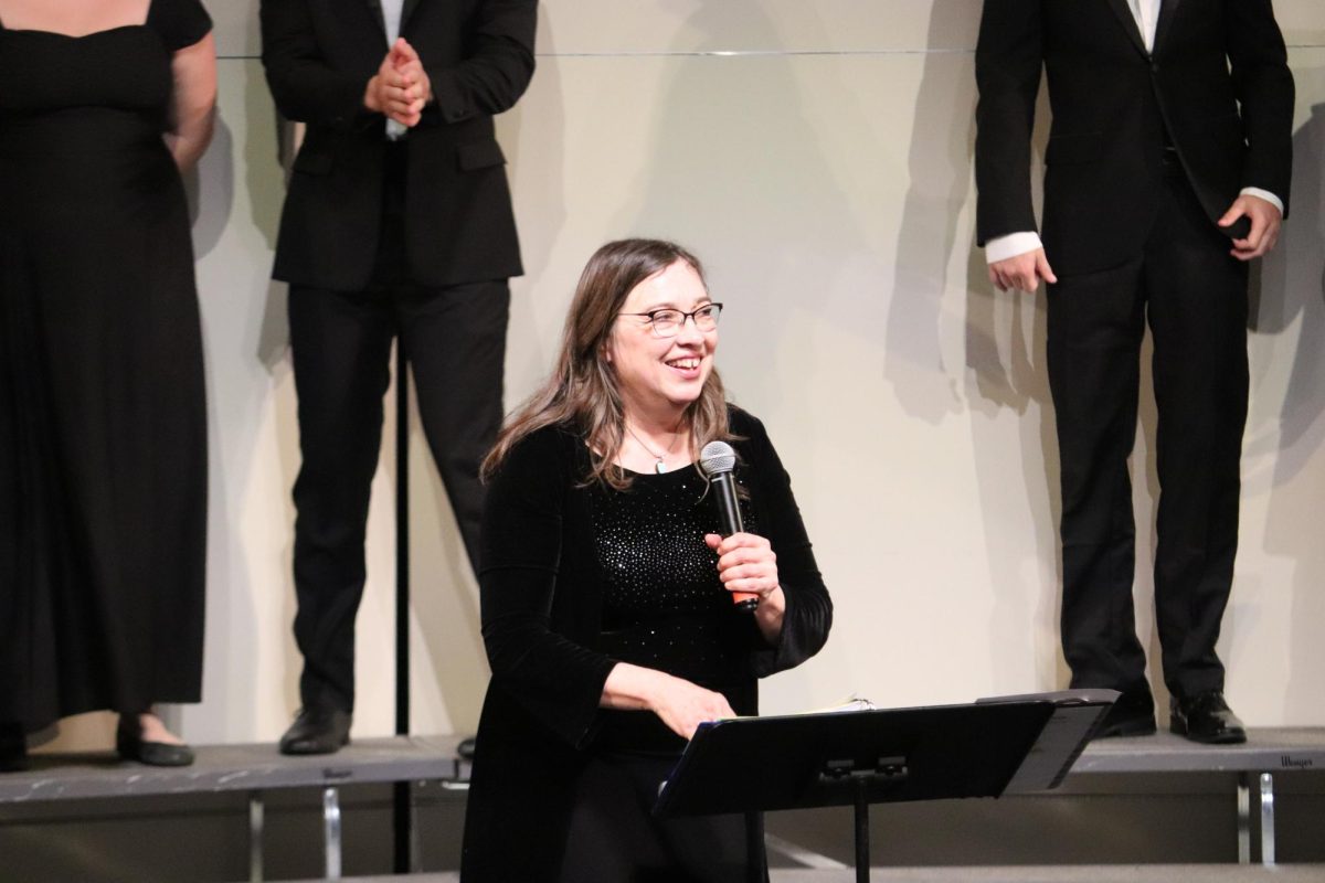 A chorus of gratitude for retiring arts teacher Davis-Omburo